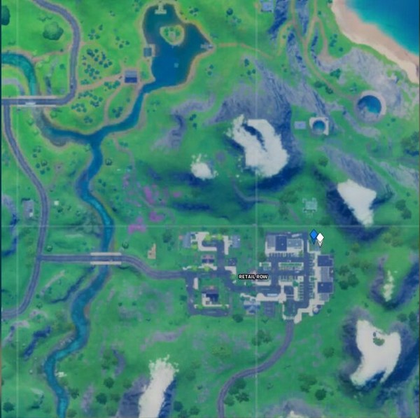 emplacement tyrolienne entre Retail Row et Steamy Stacks dans Fortnite 